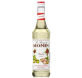Monin Pistachio syrup bottle on a white background