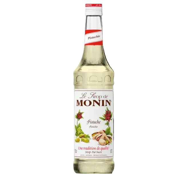 Monin Pistachio syrup bottle on a white background