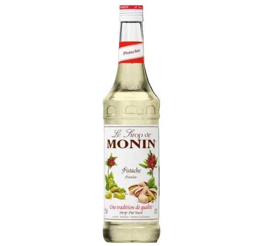 Monin Pistachio syrup bottle on a white background