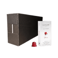 Carraro 1923 Intenso coffee capsule packaging, featuring a large matte black outer box, a white inner box with a red capsule illustration, and a single red aluminium capsule in the foreground on a white background.